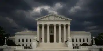 Supreme Court building in Washington D.C. with dramatic sky