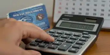 Hand calculating Social Security COLA 2026 benefits with a calendar